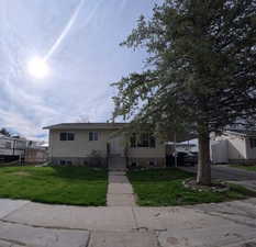 View of front of home with a front lawn