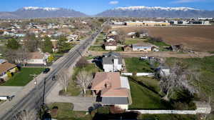 Aerial perspective of suburban area with a mountainous background