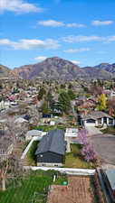 Aerial view of residential area with a mountainous background