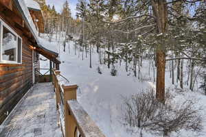 View of yard layered in snow