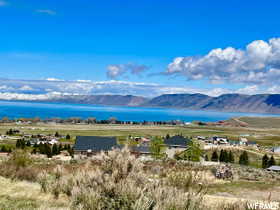 View of mountain background with a nearby body of water