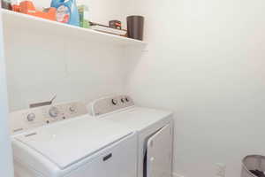 Laundry room with washer and dryer
