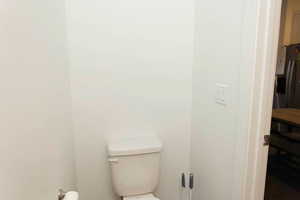 1/2 Bathroom with toilet & vanity