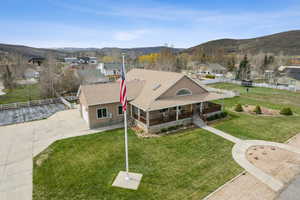 Aerial perspective of suburban area with a mountain backdrop
