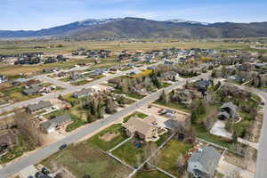 Aerial view of residential area with a mountainous background