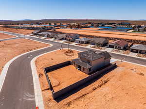 Aerial view of residential area featuring a mountain backdrop