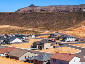 Aerial view of residential area with a mountainous background