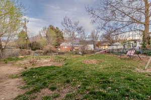 View of fenced backyard