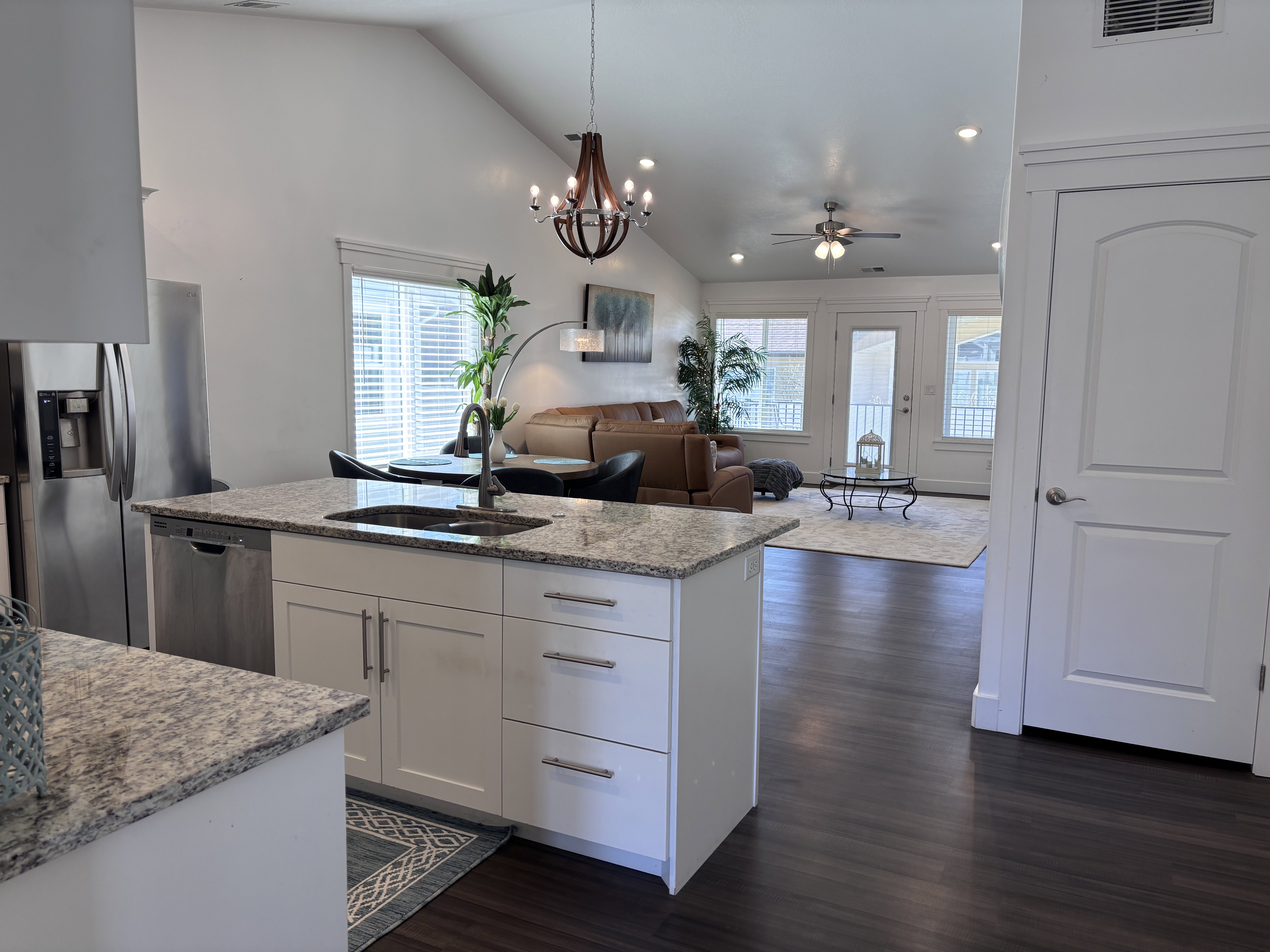 Inviting open layout with a stylish kitchen, oversized island, and effortless connection to the living area—perfect for entertaining.