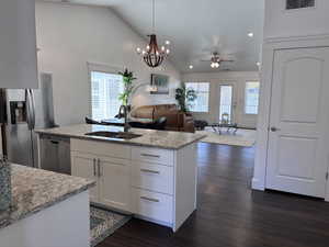 Inviting open layout with a stylish kitchen, oversized island, and effortless connection to the living area—perfect for entertaining.