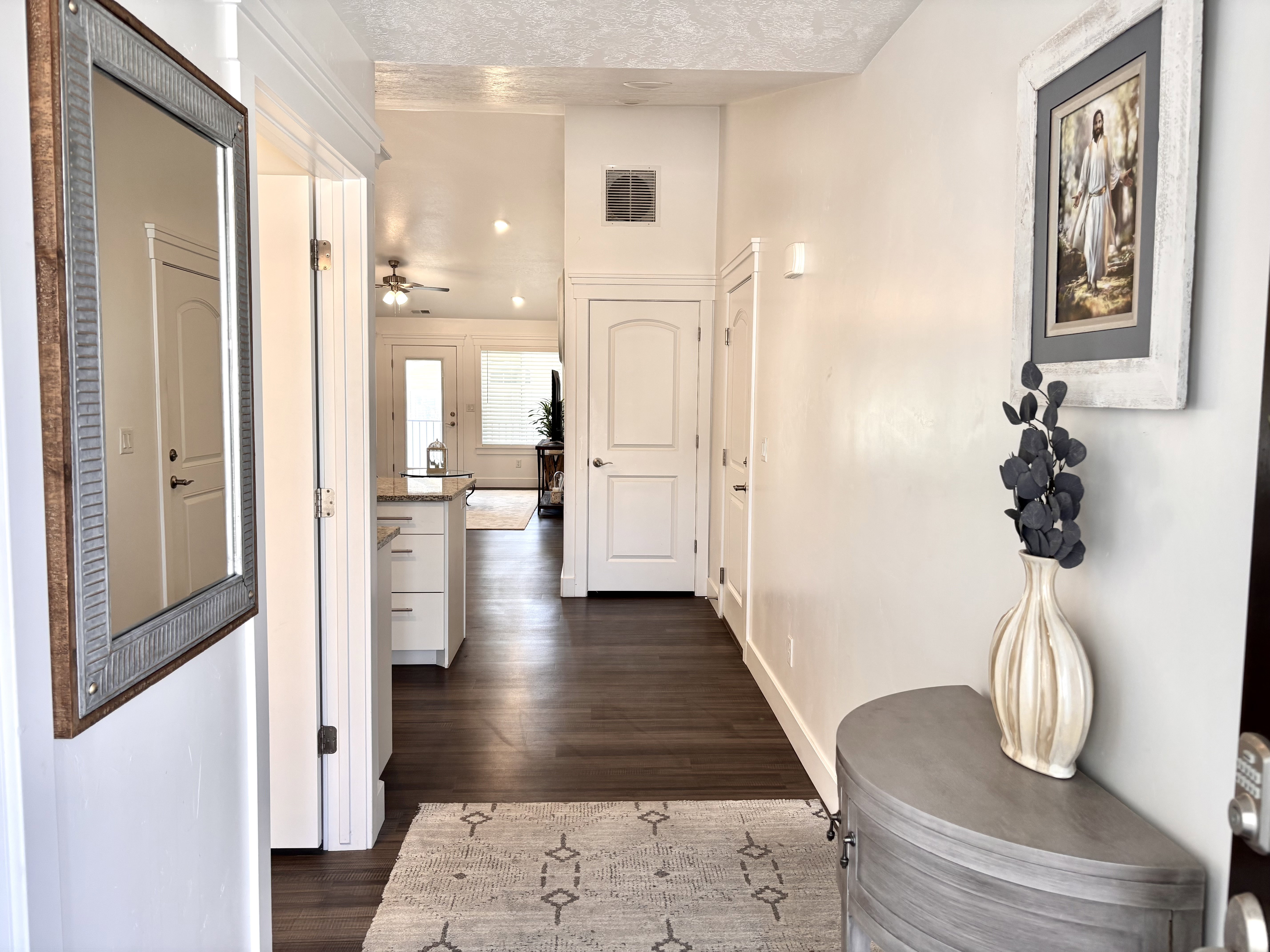 Light-filled entry with warm wood tones and a seamless, open design.