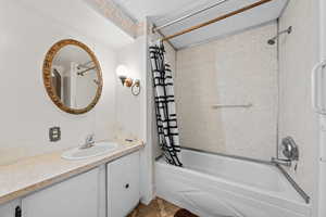 Full bathroom featuring vanity and shower / tub combo with curtain