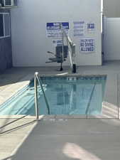 View of swimming pool with a pool