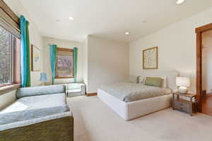 Carpeted bedroom featuring recessed lighting