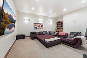 Living room featuring light carpet and recessed lighting