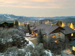 Snowy aerial view with a mountain view