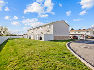 View of side of home featuring brick siding