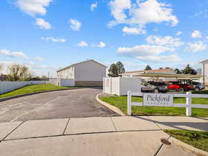 View of asphalt road with curbs