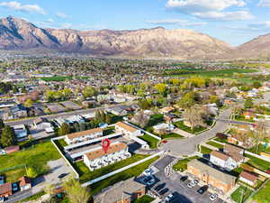 Aerial perspective of suburban area featuring a mountain backdrop