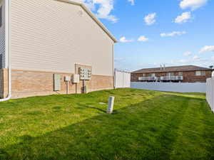 View of fenced backyard