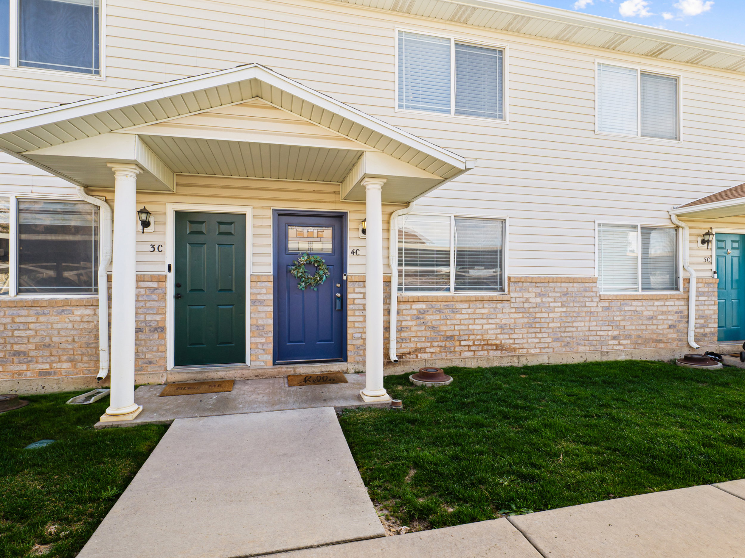 Property entrance featuring a yard