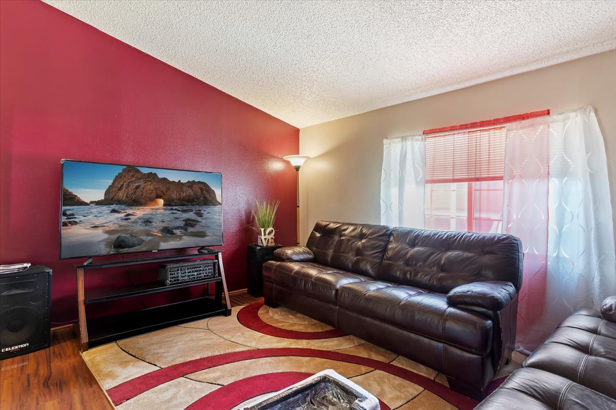 Living area with wood finished floors