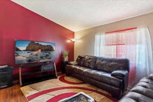 Living area with wood finished floors