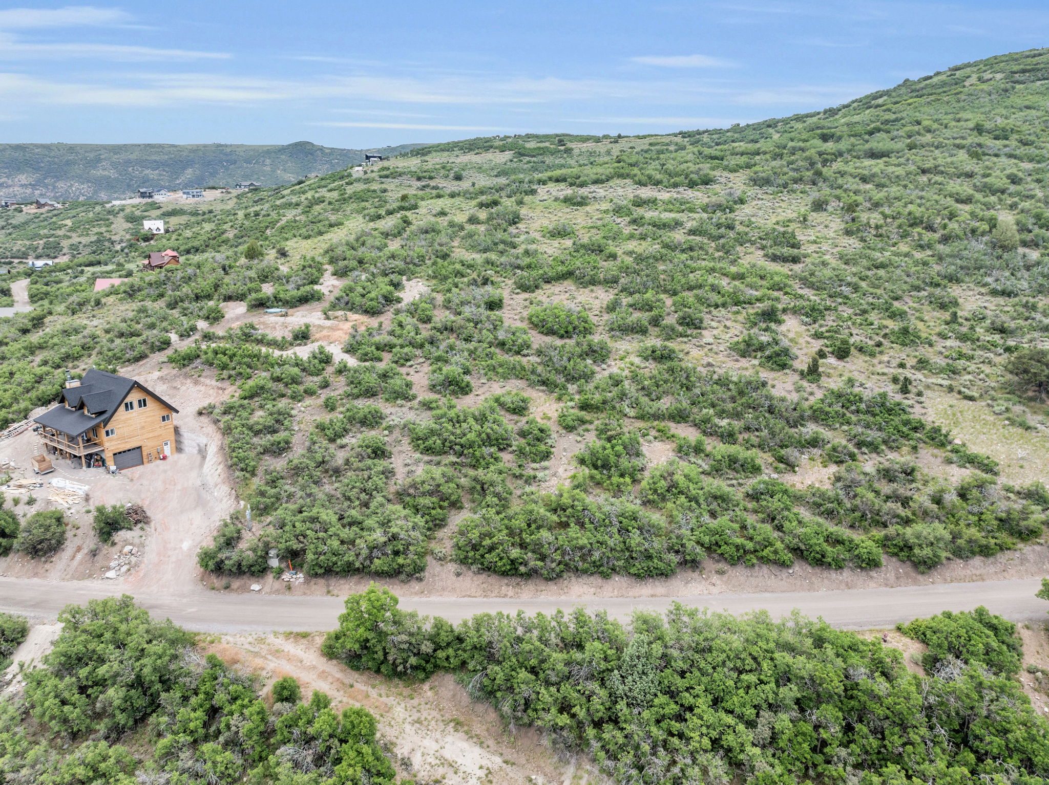 Drone / aerial view of a mountainous background