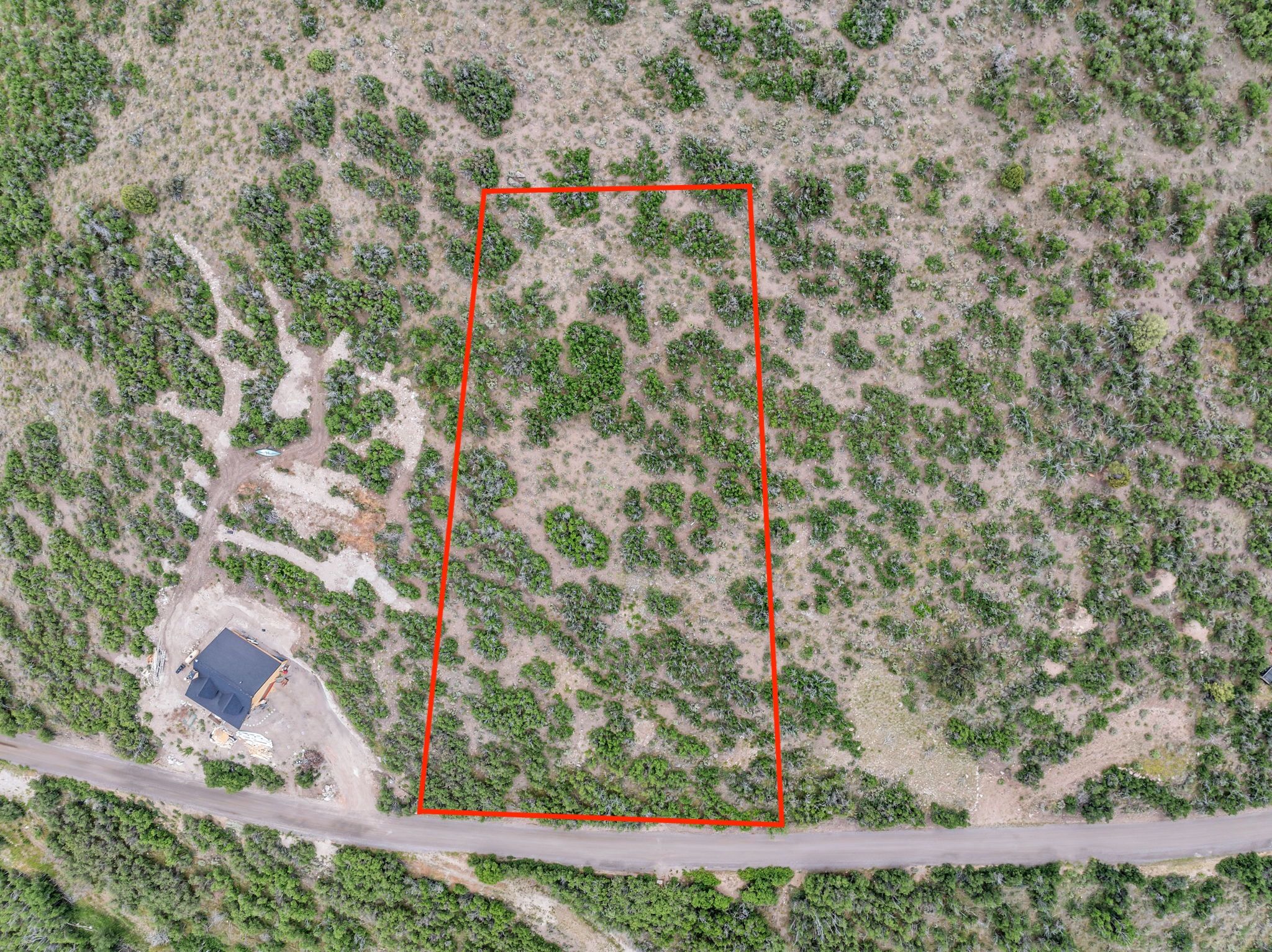 Overview of rural landscape with a desert landscape and property parcel outlined