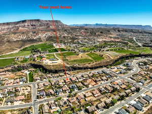 Aerial view of residential area featuring mountains