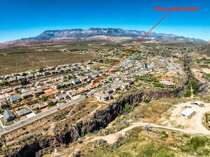 Aerial view of residential area with a mountain backdrop