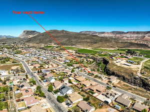 Aerial view of residential area featuring a mountain backdrop