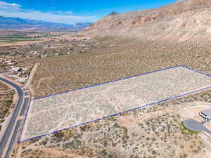 View of rural area with property boundaries highlighted and mountains