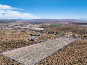 View of rural area featuring property parcel outlined and mountains