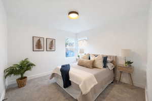 Bedroom featuring carpet