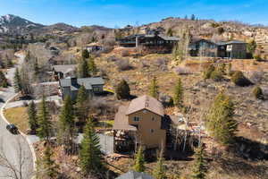 Aerial view of residential area featuring a mountain backdrop