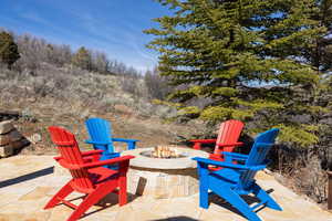 View of patio / terrace with a fire pit