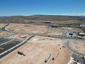 Aerial view of property and surrounding area with mountains and rural landscape