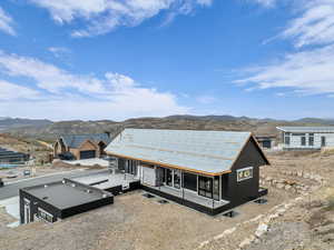 View of front facade with a mountain view