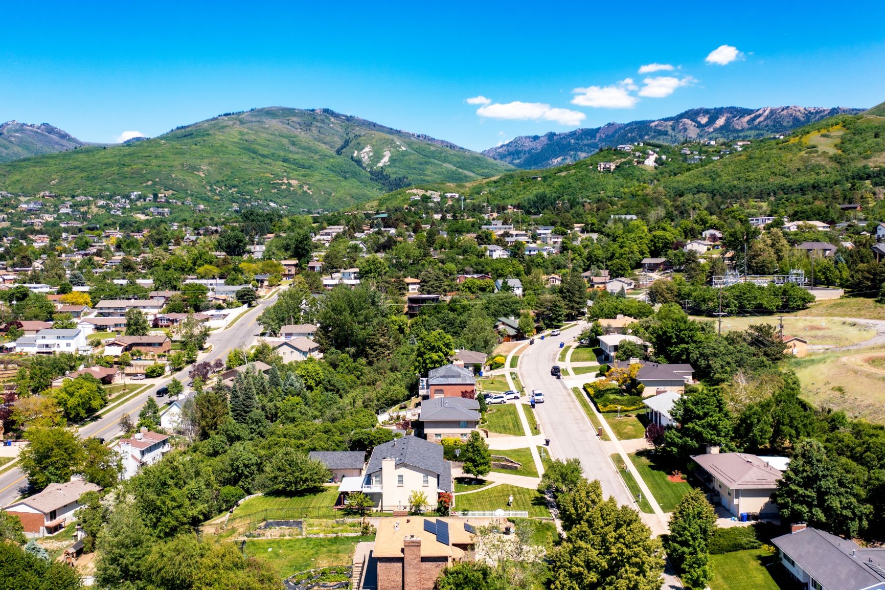 Aerial view of residential area with a mountain backdrop