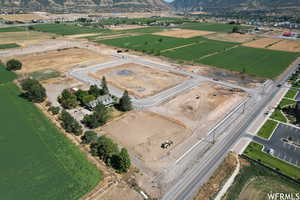 Aerial view of property's location featuring mountains and rural landscape