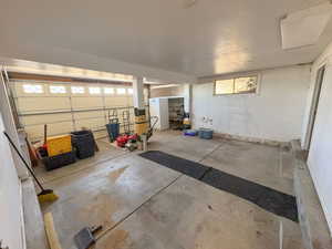 Garage with freestanding refrigerator