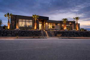 Contemporary home featuring stucco siding
