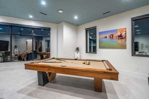Playroom with billiards and recessed lighting