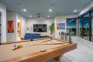 Recreation room with recessed lighting, ceiling fan, and billiards