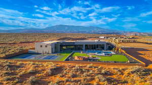 View of subject property with mountains