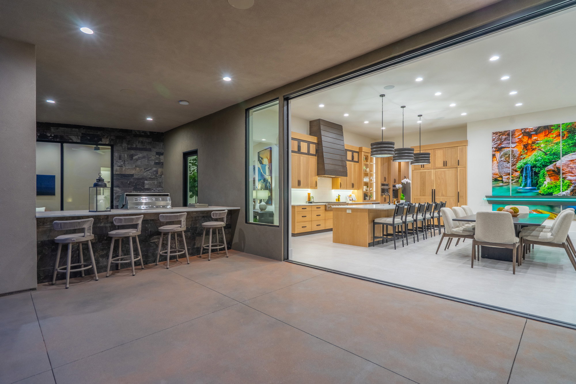 Dining area featuring recessed lighting and finished concrete floors