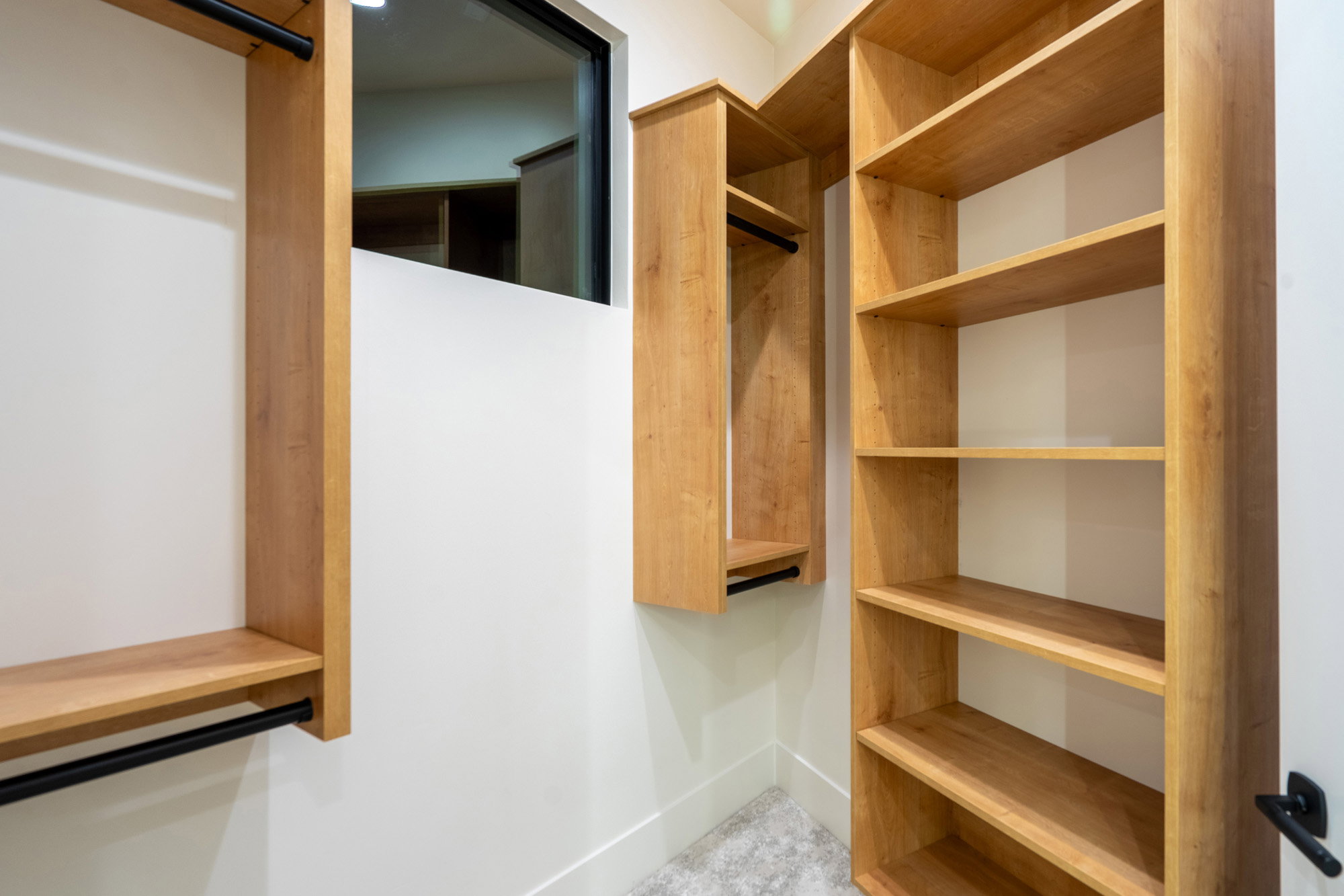 Walk in closet with a barn door