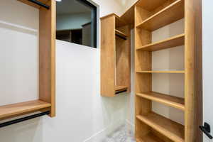 Walk in closet with a barn door