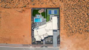 View of subject property with a pool area